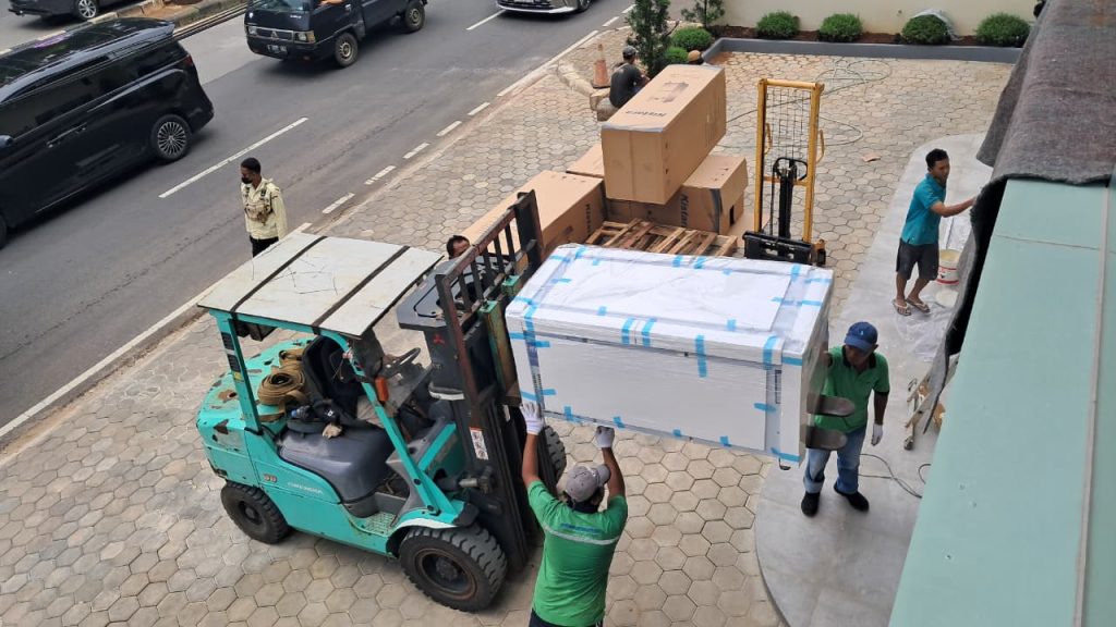 professional factory relocation team handling machines